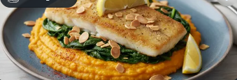 Seehechtfilet à la Meunière mit Spinat und Mandeln